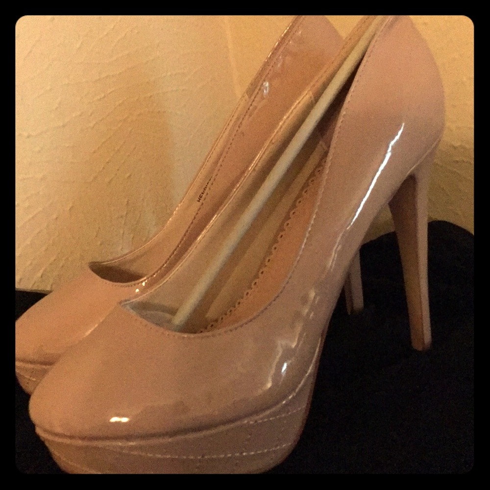Pearl Cream Madison Platform Heels that look new.